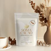 Organic Peruvian ceremonial cacao package with dried flowers, promoting health benefits and award-winning cacao drink.